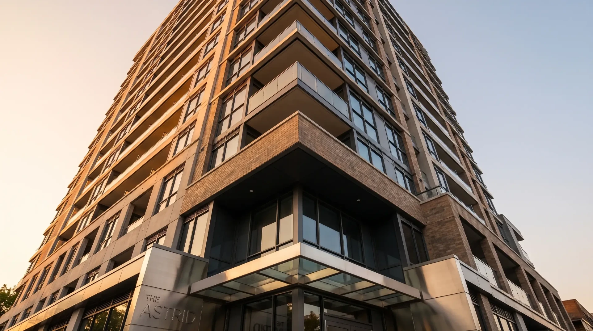 Landscaped entrance of a well-maintained condominium community